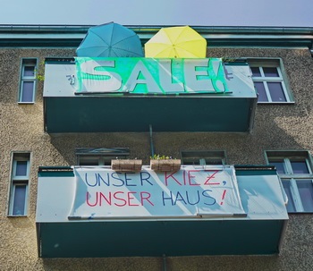 Bild mit Banner: Unser Kiez, unser Haus